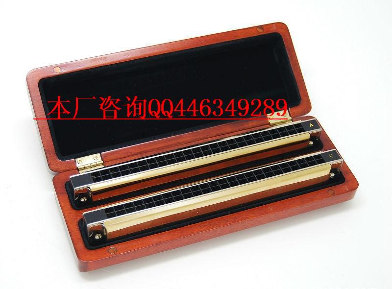 供应生产2012年新版口琴木盒，古筝木盒