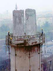 供应用于高空建筑的专业承接烟囱新建，拆除，防腐工程图片