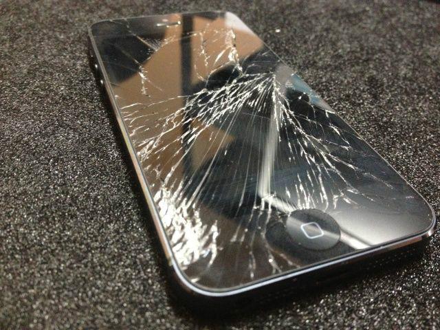 iPhoneX手机后盖摔碎更换图片